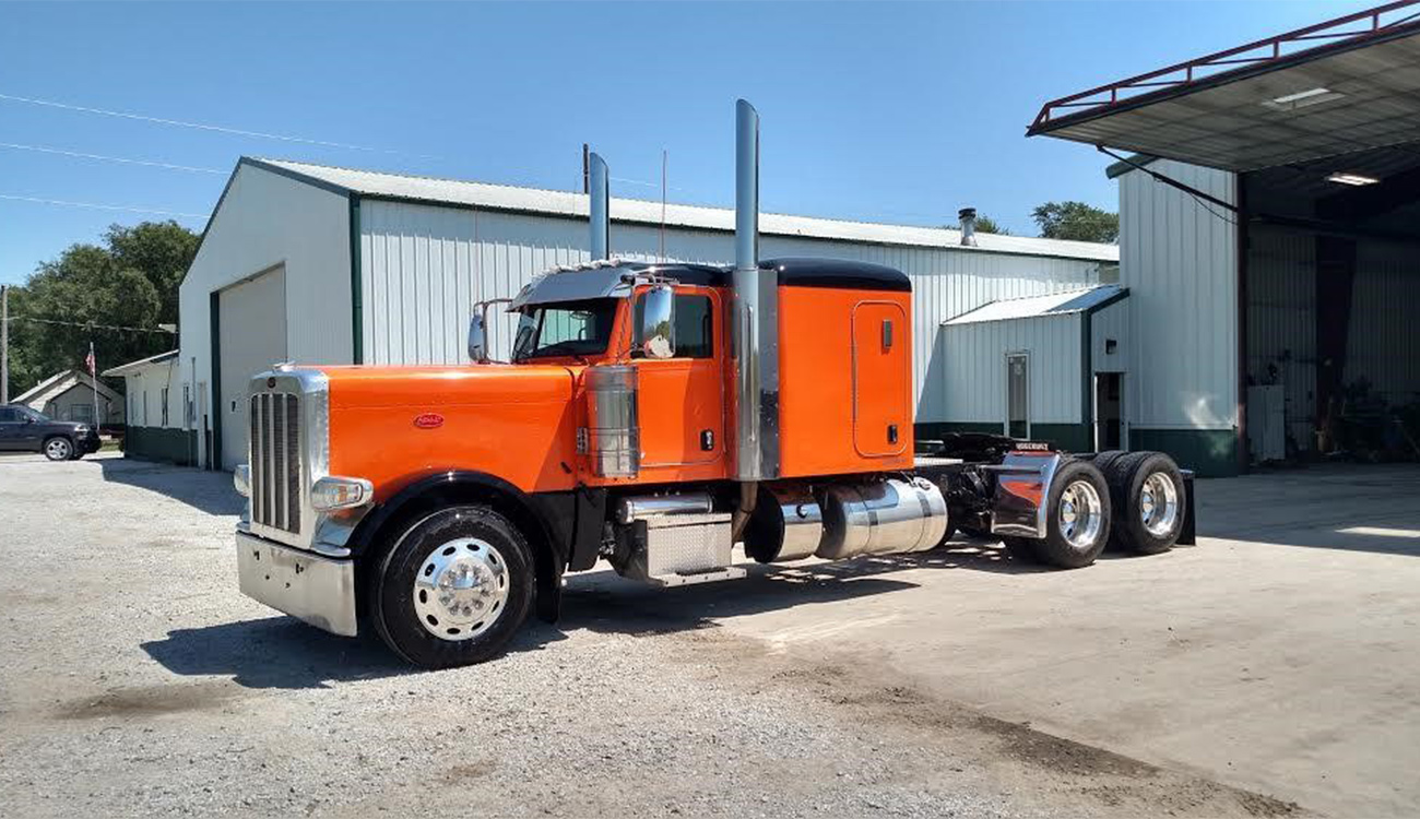 Orange Peterbilt truck